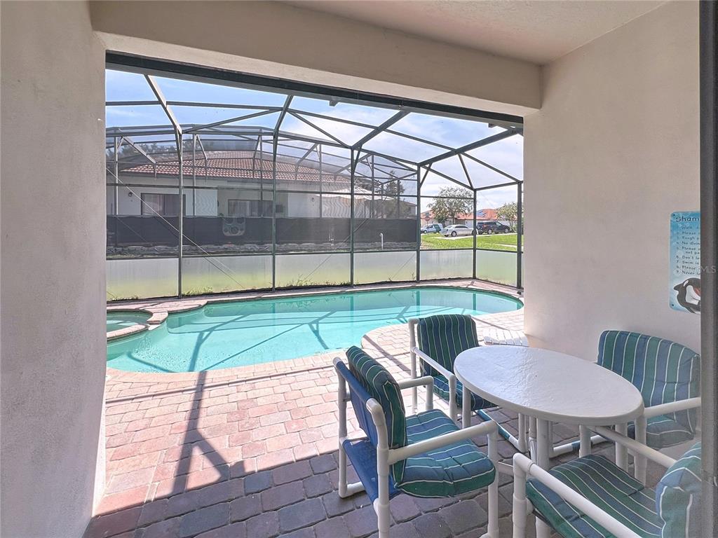 102 Sandy Point Way Clermont, FL 34714 - Photo 24 of 33 a view of a dining room with furniture window and outside view