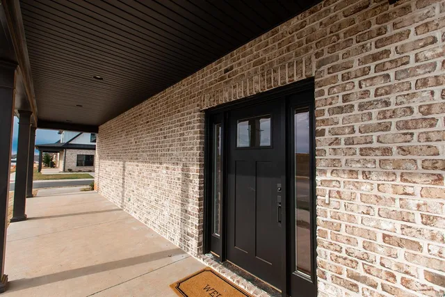 a front view of a house with garage
