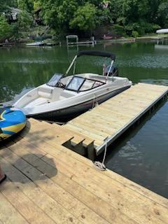 13 Pinetree Court Putnam, IL 61560 - Photo 3 of 5 a view of a lake with couches and pool