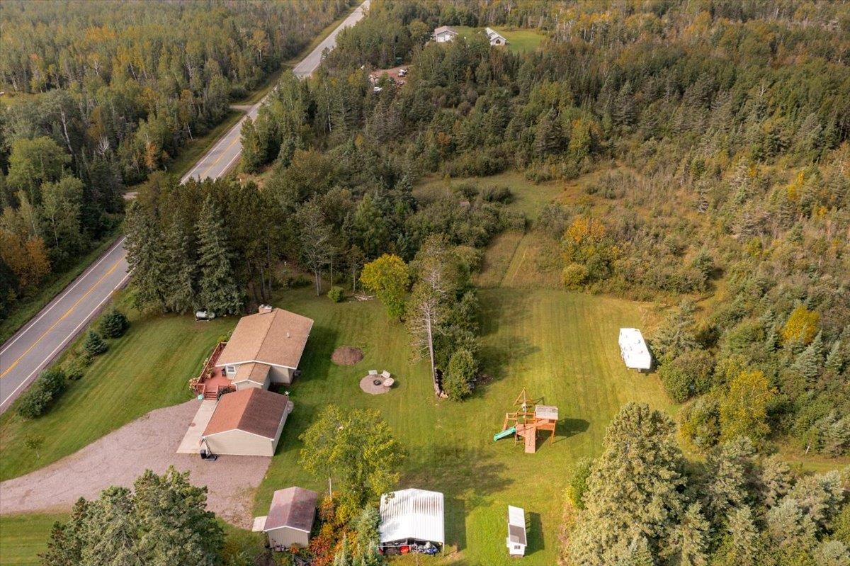 645 Stanley Road Two Harbors, MN 55616 - Photo 23 of 26 Aerial overview of property's location featuring a heavily wooded area