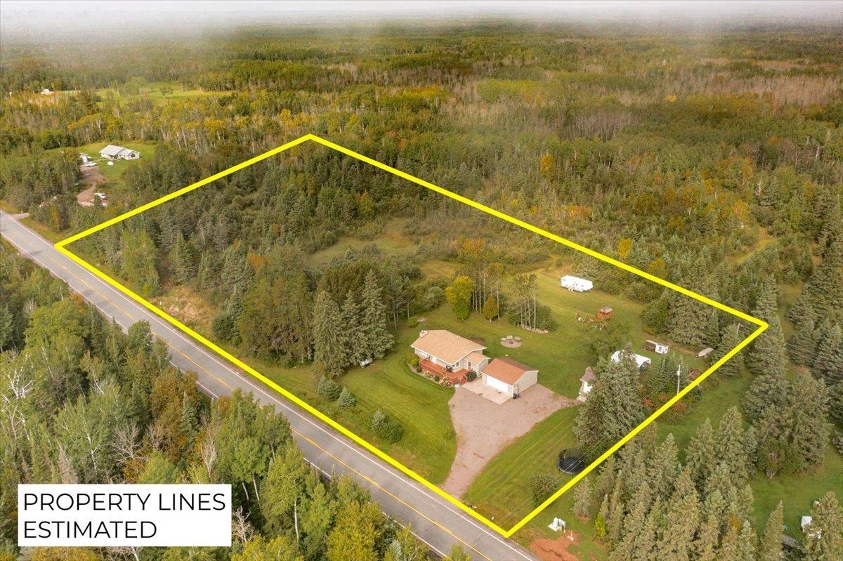 645 Stanley Road Two Harbors, MN 55616 - Photo 25 of 26 Aerial overview of property's location with property parcel outlined and a heavily wooded area