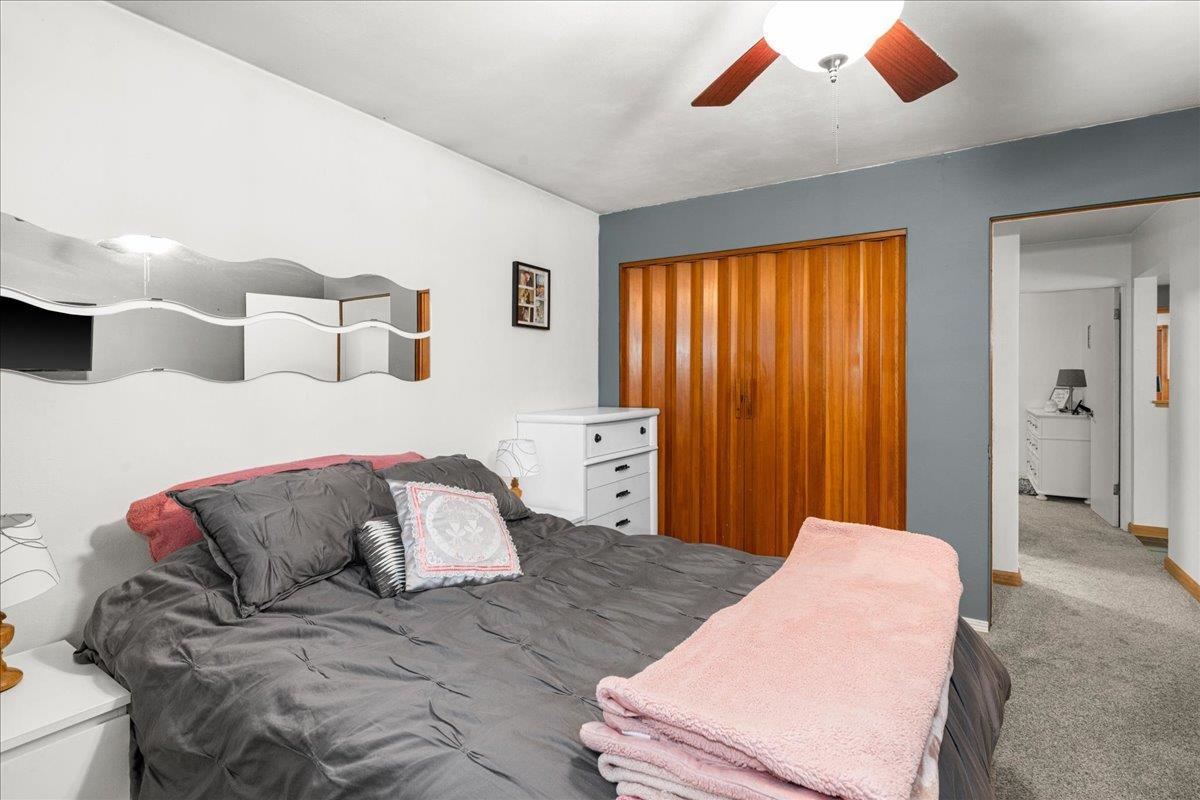 645 Stanley Road Two Harbors, MN 55616 - Photo 10 of 26 Bedroom with carpet, a closet, and ceiling fan