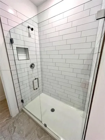 a view of a room with racks on the wall