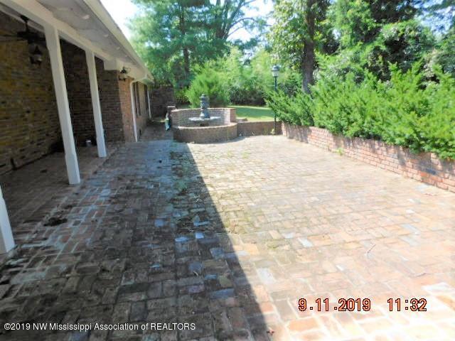 400 Cedar Hills Road Holly Springs, MS 38635 - Photo 25 of 28 brick patio with fountain