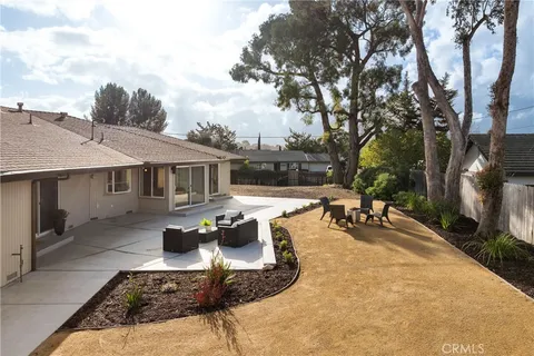 swimming pool view with a seating space