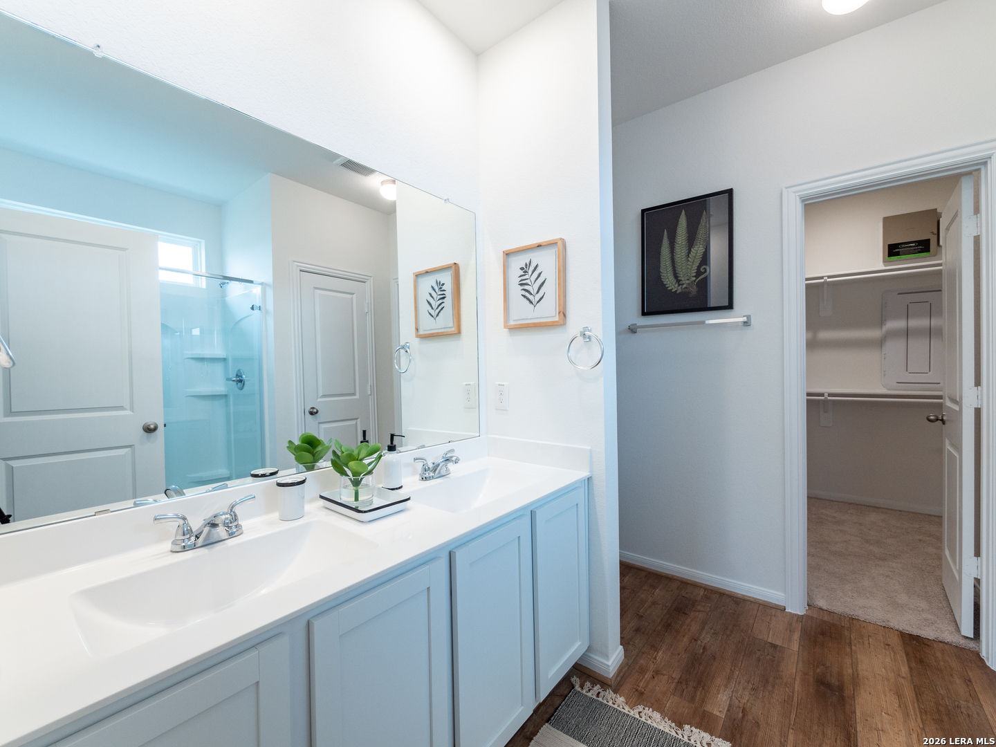 10715 Upwind Turn Converse, TX 78109 - Photo 11 of 17 a bathroom with a sink and a mirror