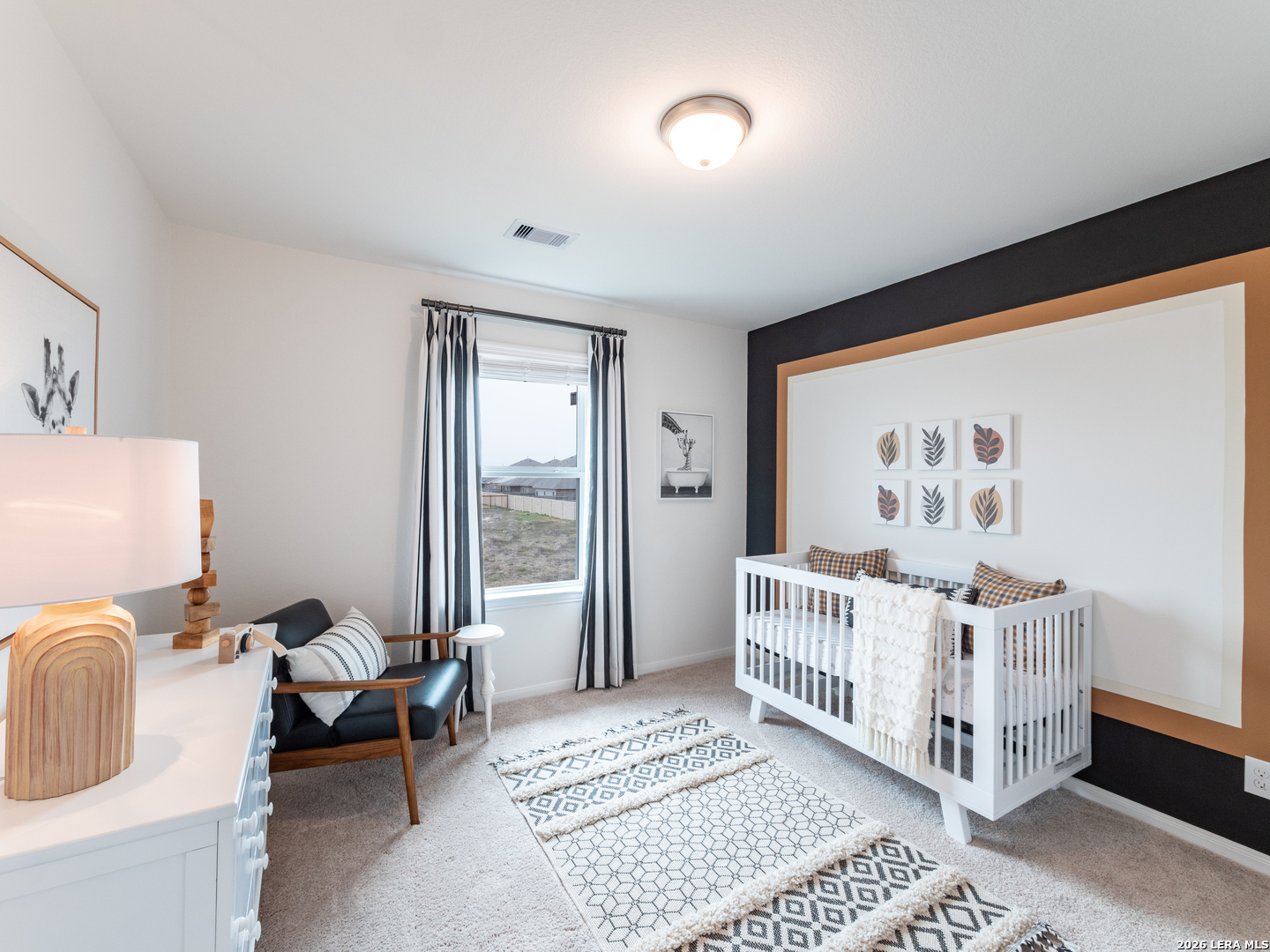 10715 Upwind Turn Converse, TX 78109 - Photo 16 of 17 a bedroom with furniture and a window
