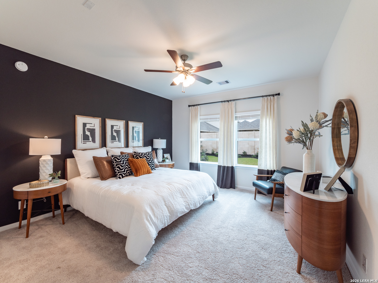 10715 Upwind Turn Converse, TX 78109 - Photo 10 of 17 a bedroom with bed and a large window