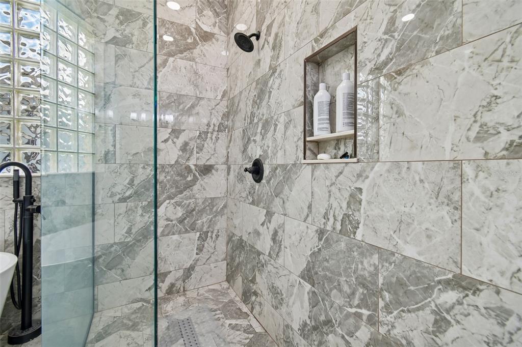 3311 Stonebridge Trail Valrico, FL 33596 - Photo 25 of 33 a bathroom with a shower