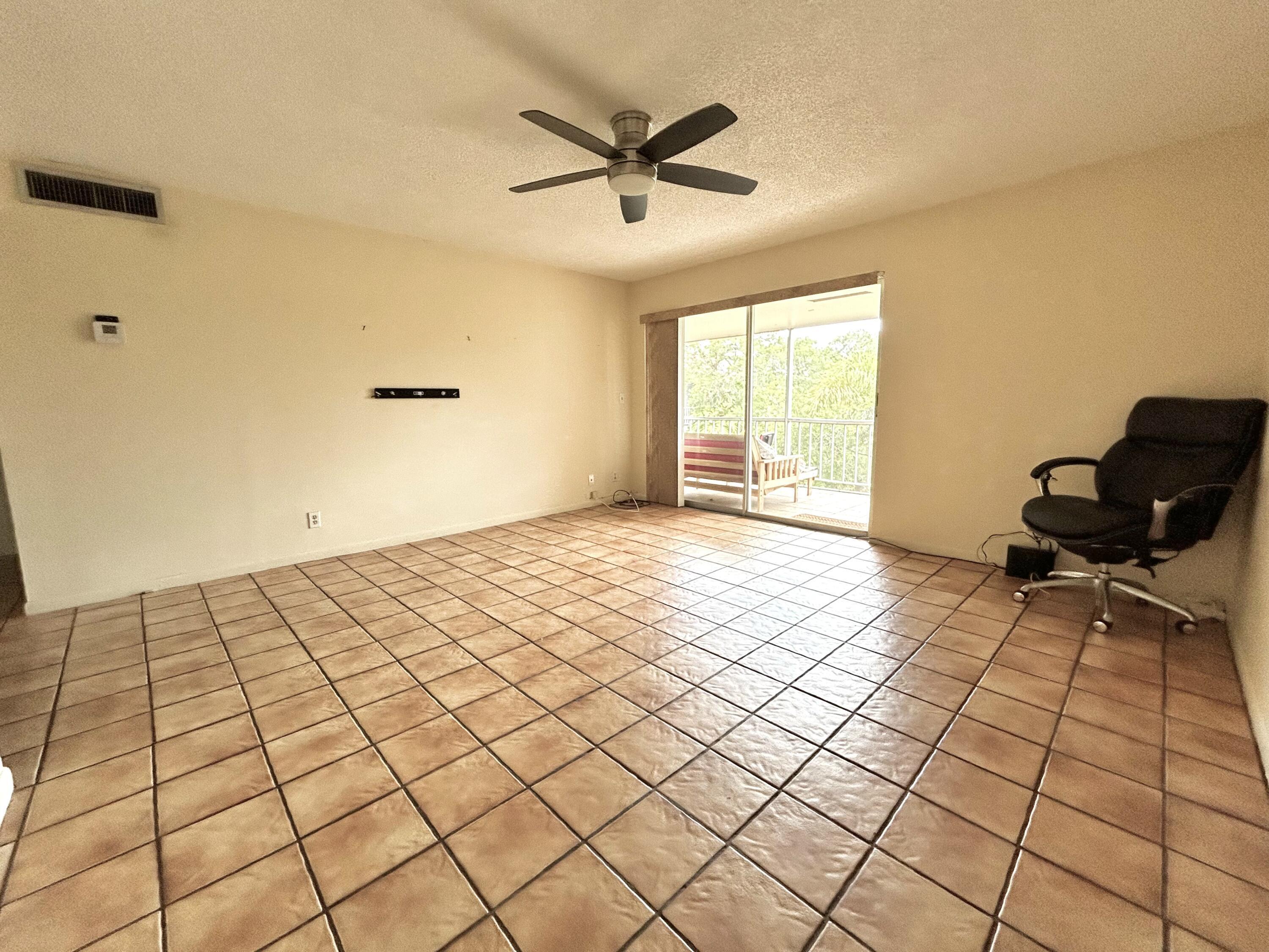 642 Northwest 13th Street, Unit 35 Boca Raton, FL 33486 - Photo 3 of 11 living room