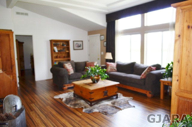 877 R Road Mack, CO 81525 - Photo 2 of 9 a living room with furniture and a large window
