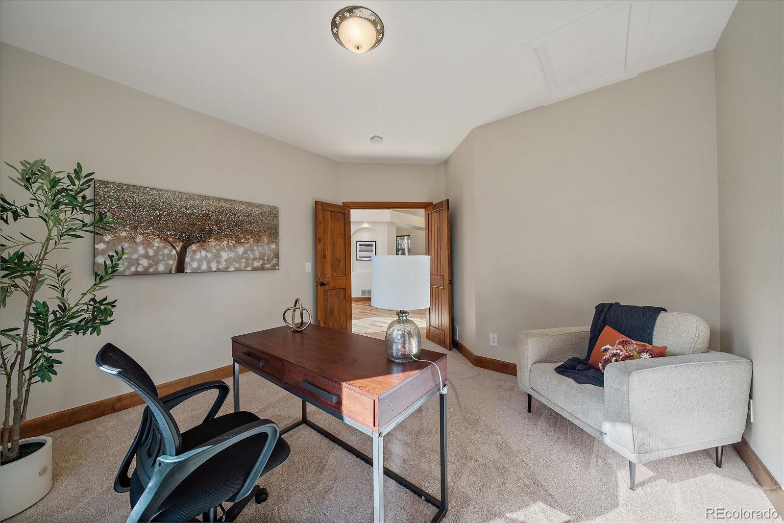 28857 Cedar Circle Evergreen, CO 80439 - Photo 27 of 50 a living room with furniture