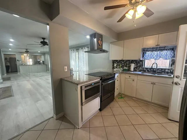 a view of kitchen and windows