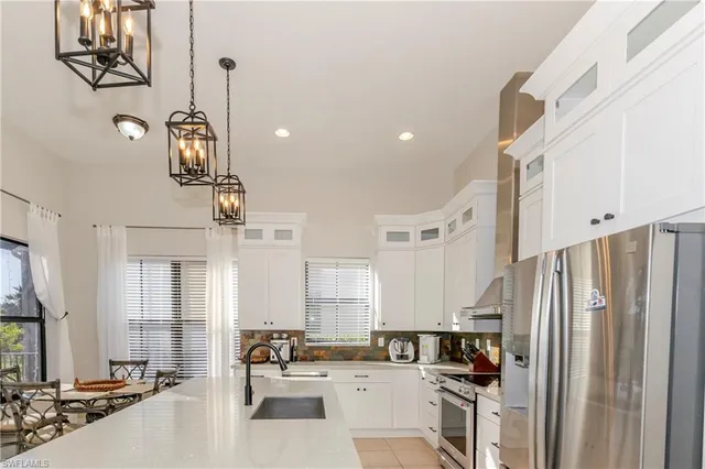 a view of outdoor space with a table and chairs