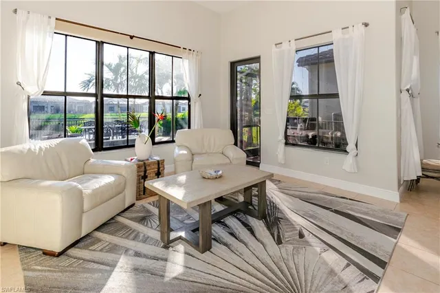 a view of outdoor space with seating and swimming pool