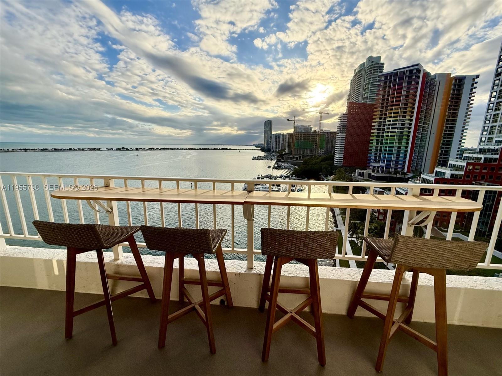 a view of a chairs and table on the terrace
