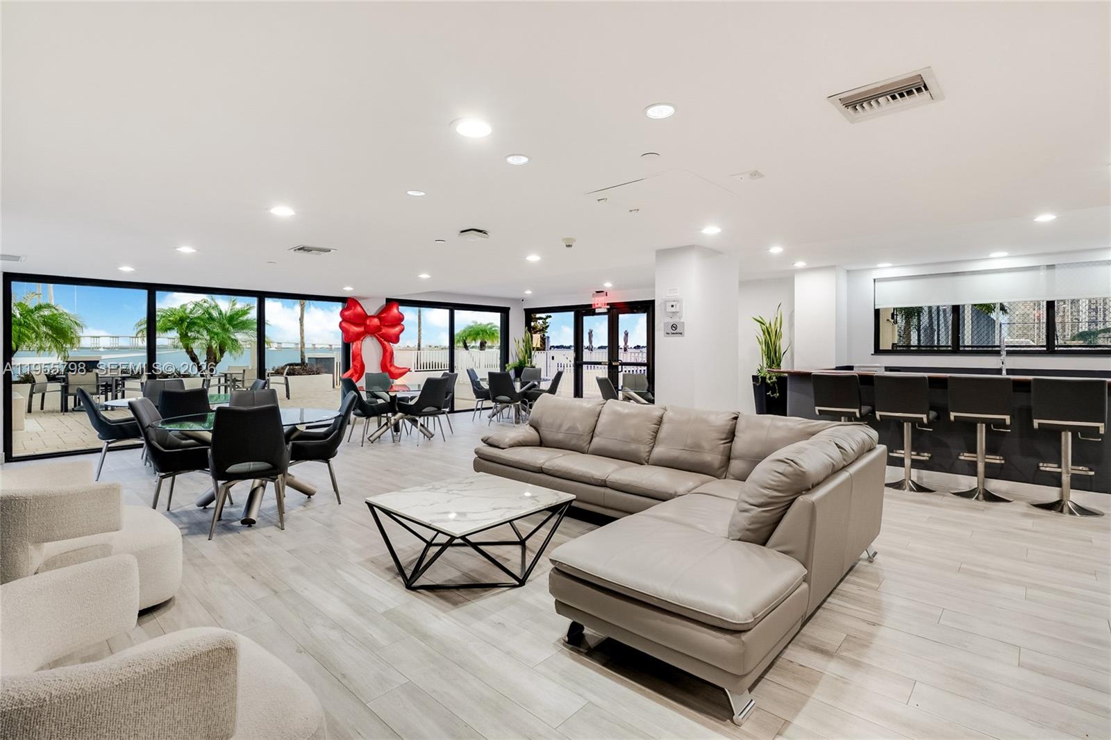 200 Southeast 15th Road, Unit 15C Miami, FL 33129 - Photo 24 of 31 a living room with furniture and kitchen view