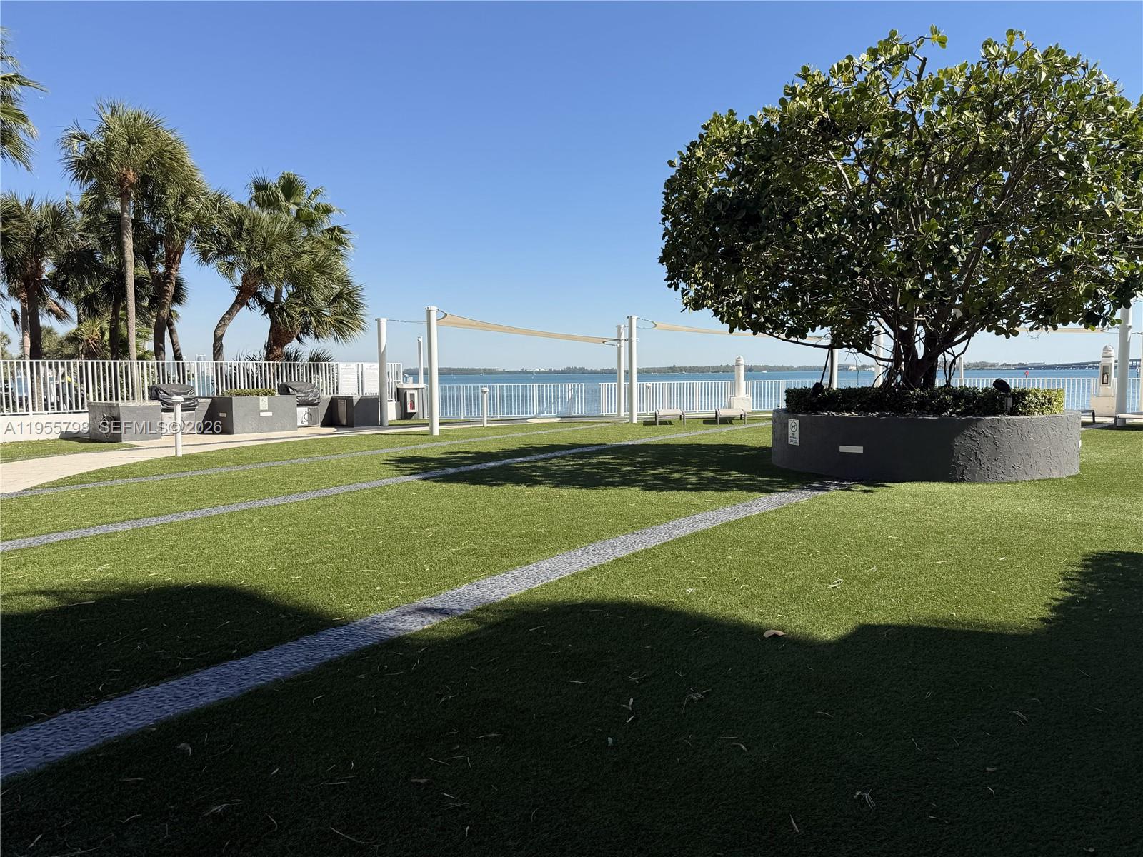 200 Southeast 15th Road, Unit 15C Miami, FL 33129 - Photo 26 of 31 a view of a park with large trees