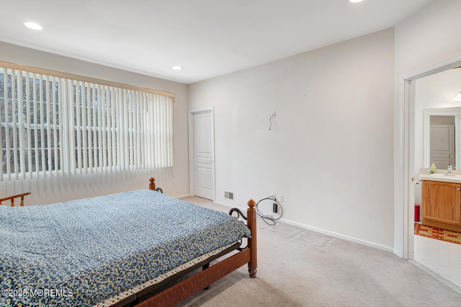 16 Seagull Drive Little Egg Harbor, NJ 08087 - Photo 11 of 27 a bedroom with a bed and a painting on the wall