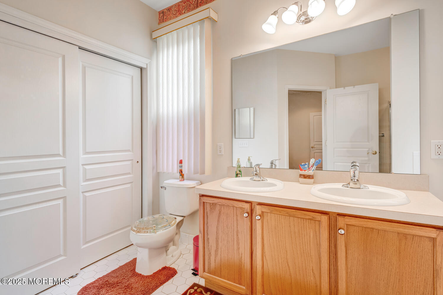 16 Seagull Drive Little Egg Harbor, NJ 08087 - Photo 15 of 27 a bathroom with a sink a toilet and shower