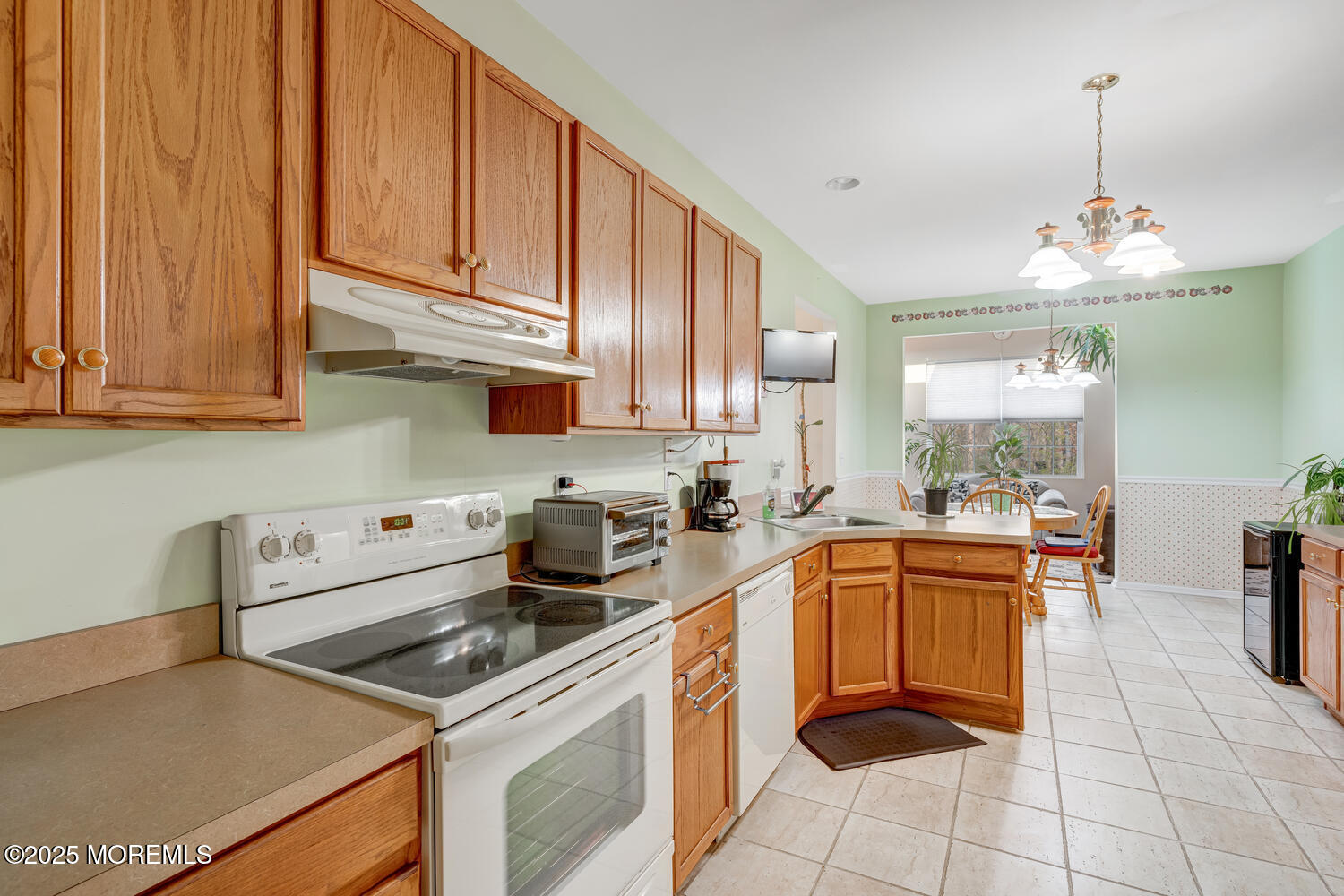 16 Seagull Drive Little Egg Harbor, NJ 08087 - Photo 16 of 27 a kitchen with stainless steel appliances granite countertop a sink and cabinets