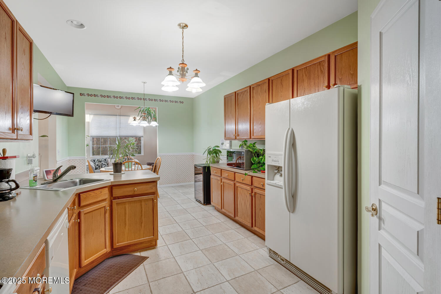 16 Seagull Drive Little Egg Harbor, NJ 08087 - Photo 17 of 27 a kitchen with stainless steel appliances granite countertop a refrigerator and a sink