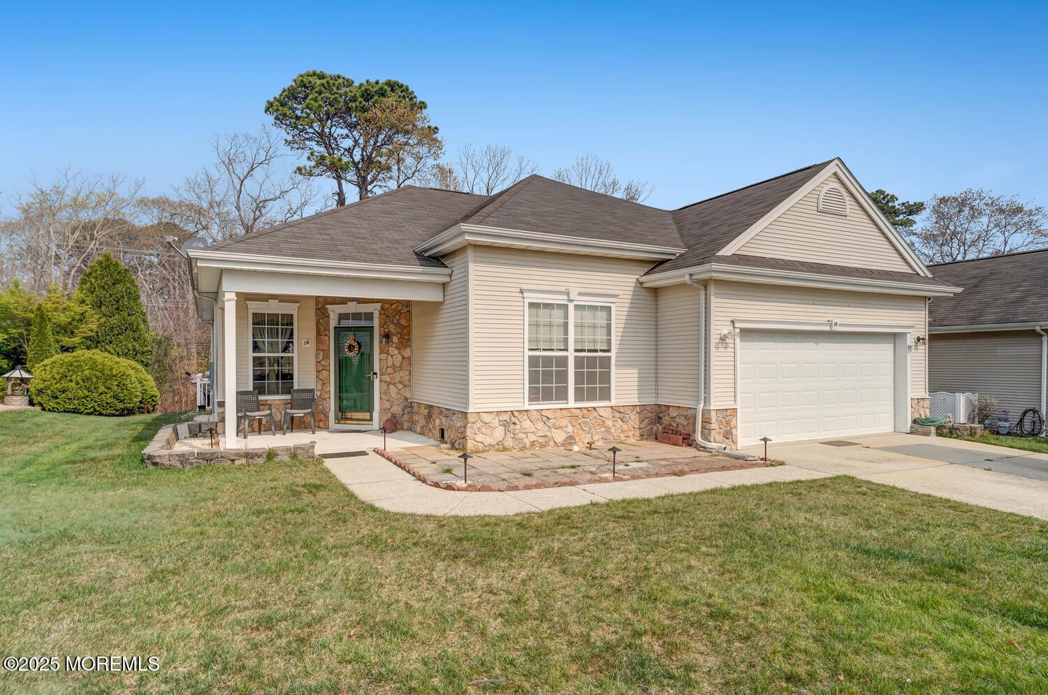 16 Seagull Drive Little Egg Harbor, NJ 08087 - Photo 2 of 27 a front view of a house with a garden and yard