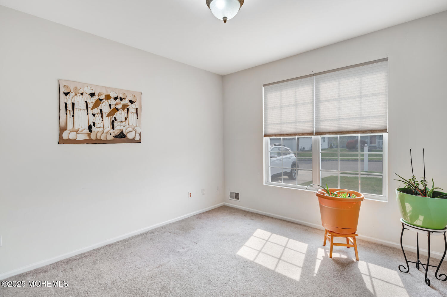 16 Seagull Drive Little Egg Harbor, NJ 08087 - Photo 4 of 27 a view of an empty room with a window and table