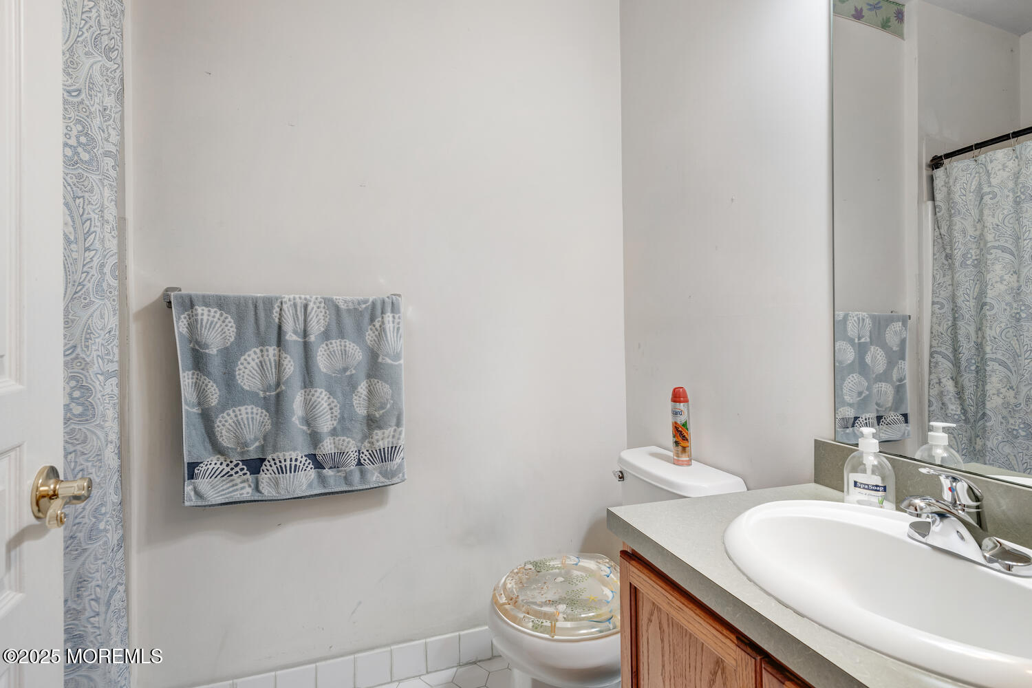 16 Seagull Drive Little Egg Harbor, NJ 08087 - Photo 10 of 27 a bathroom with a toilet sink and mirror