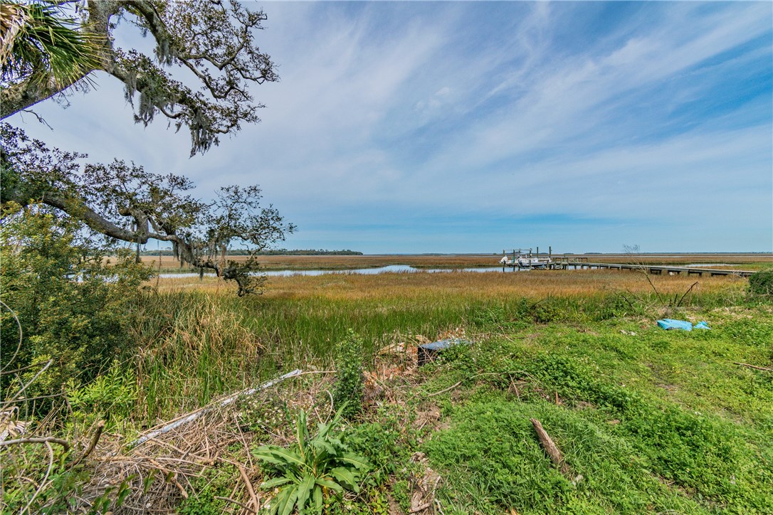 97246 Pirates Point Road Yulee, FL 32097 - Photo 27 of 32 a view of a lake with a city