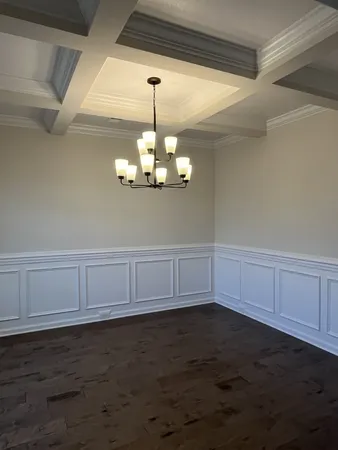 a view of kitchen and chandelier