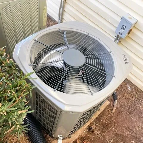 a view of a car park in front of house