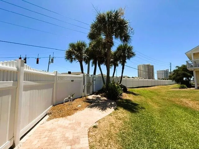 an aerial view of a house with outdoor space patio and swimming pool