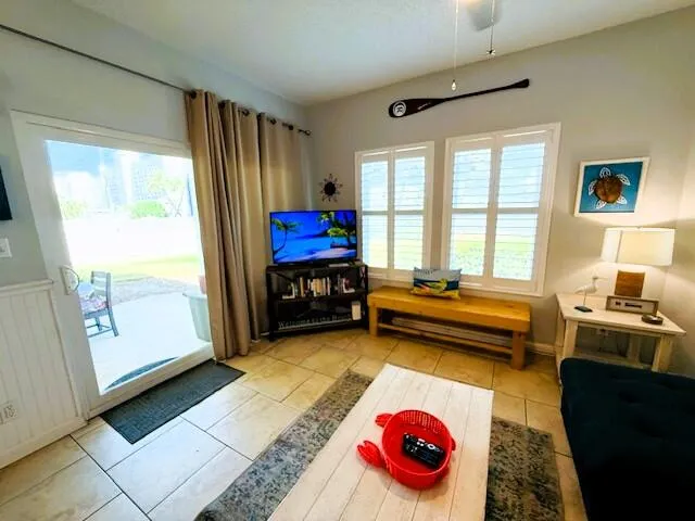 a living room with furniture and a table