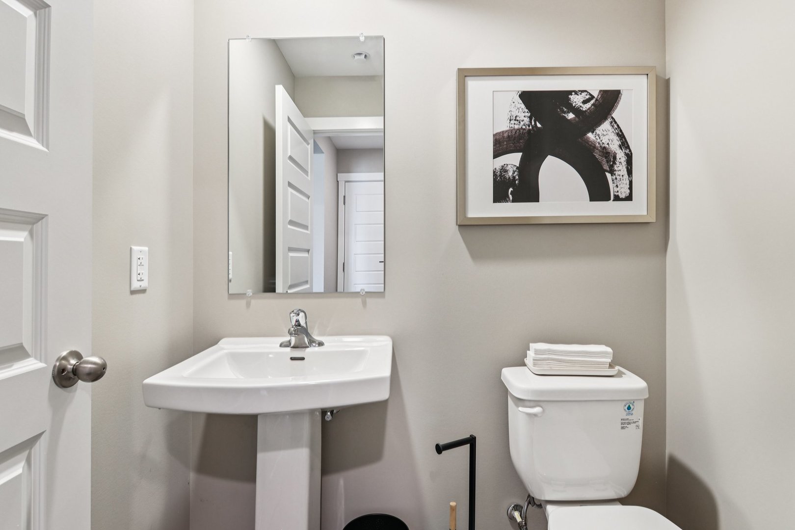 2255 Riesling Road Oswego, IL 60543 - Photo 11 of 27 a bathroom with a toilet a sink and mirror