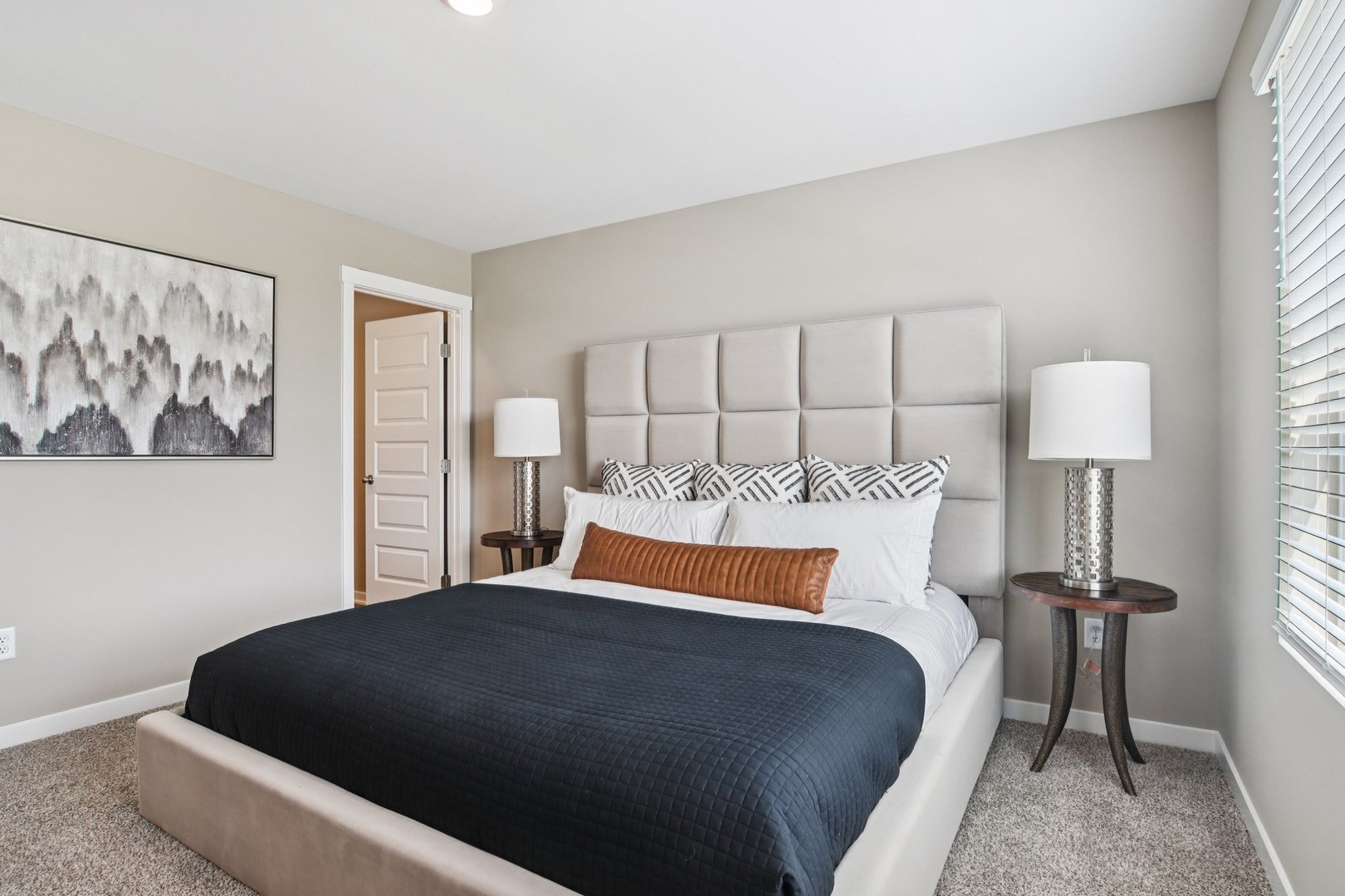 2255 Riesling Road Oswego, IL 60543 - Photo 18 of 27 a bedroom with a bed and lamp