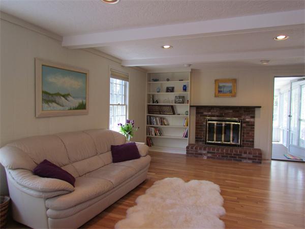 46 Hillcrest Road Weston, MA 02493 - Photo 11 of 21 a living room with furniture and a fireplace