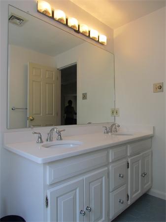 46 Hillcrest Road Weston, MA 02493 - Photo 18 of 21 a bathroom with a sink and a mirror