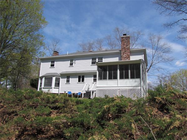 46 Hillcrest Road Weston, MA 02493 - Photo 2 of 21 a front view of a house with a yard