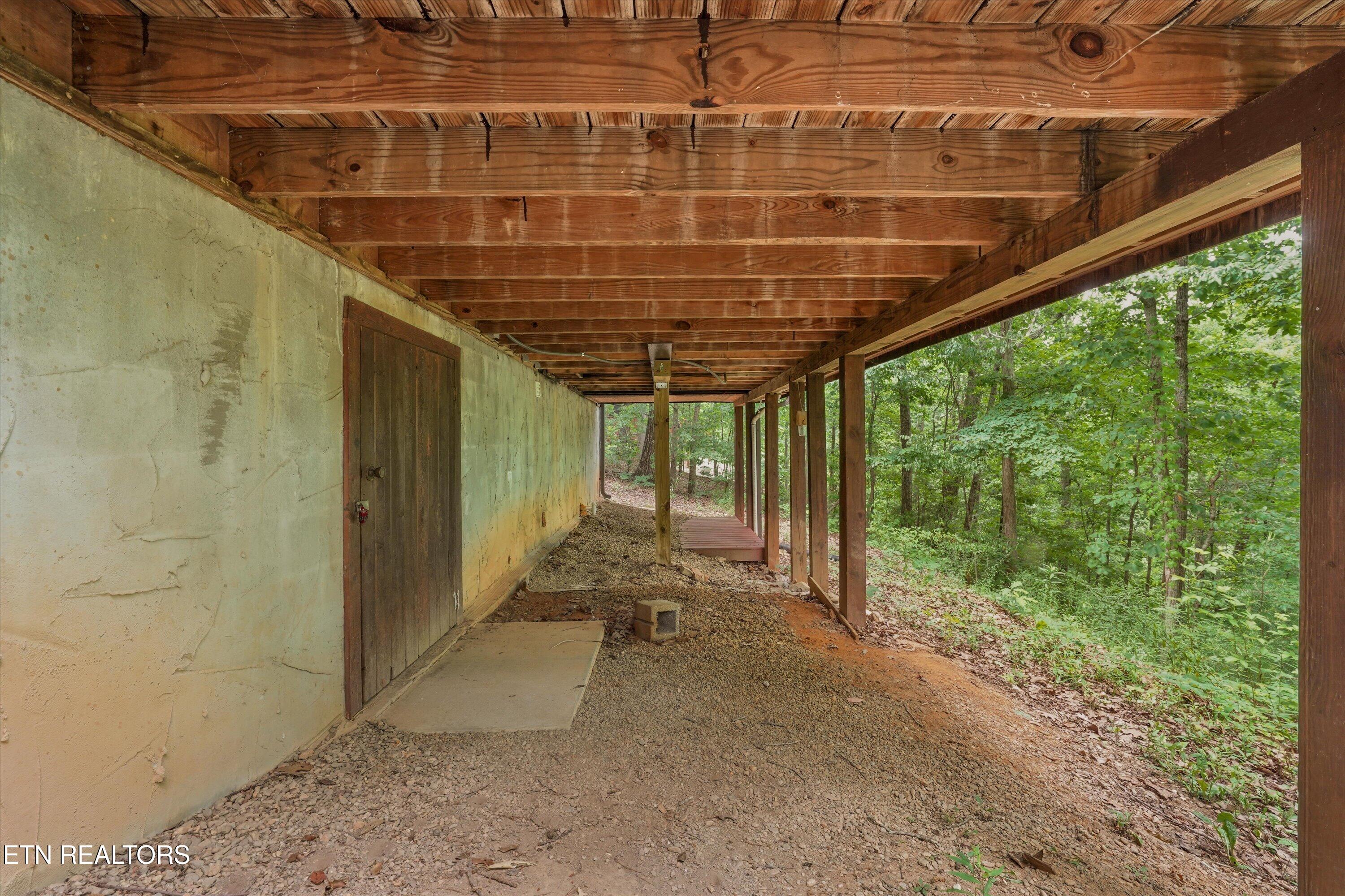 2308 Hidden Mountain Road Sevierville, TN 37876 - Photo 40 of 53 Entry to Crawl Space