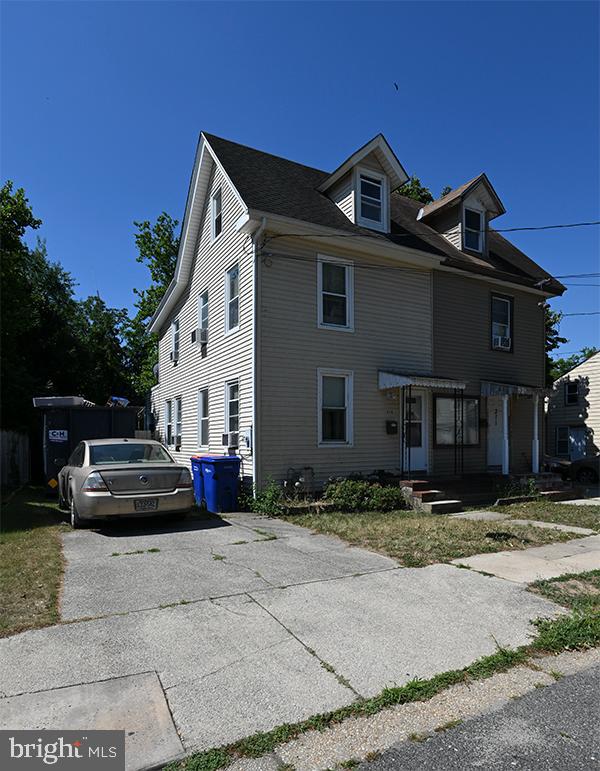 313 Sassafras Street Millville, NJ 08332 - Photo 2 of 25 a front view of a house with a yard