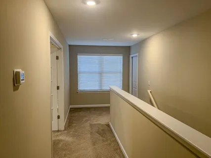 an empty room with closet area