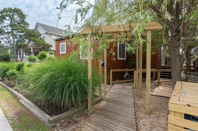 a view of a chairs and tables in the balcony