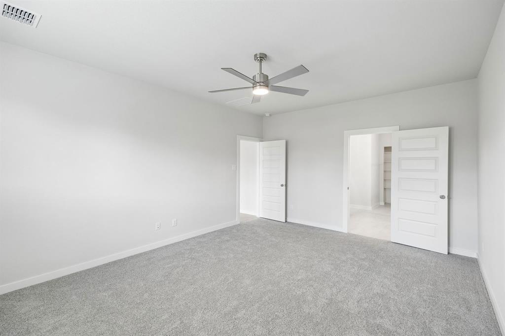 2105 Rowan Drive Anna, TX 75409 - Photo 16 of 37 Primary Suite in the Winters home plan by Trophy Signature Homes – REPRESENTATIVE PHOTO