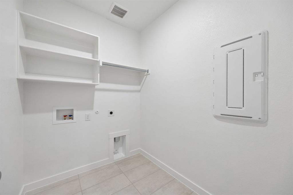 2105 Rowan Drive Anna, TX 75409 - Photo 32 of 37 Utility Room in the Winters home plan by Trophy Signature Homes – REPRESENTATIVE PHOTO