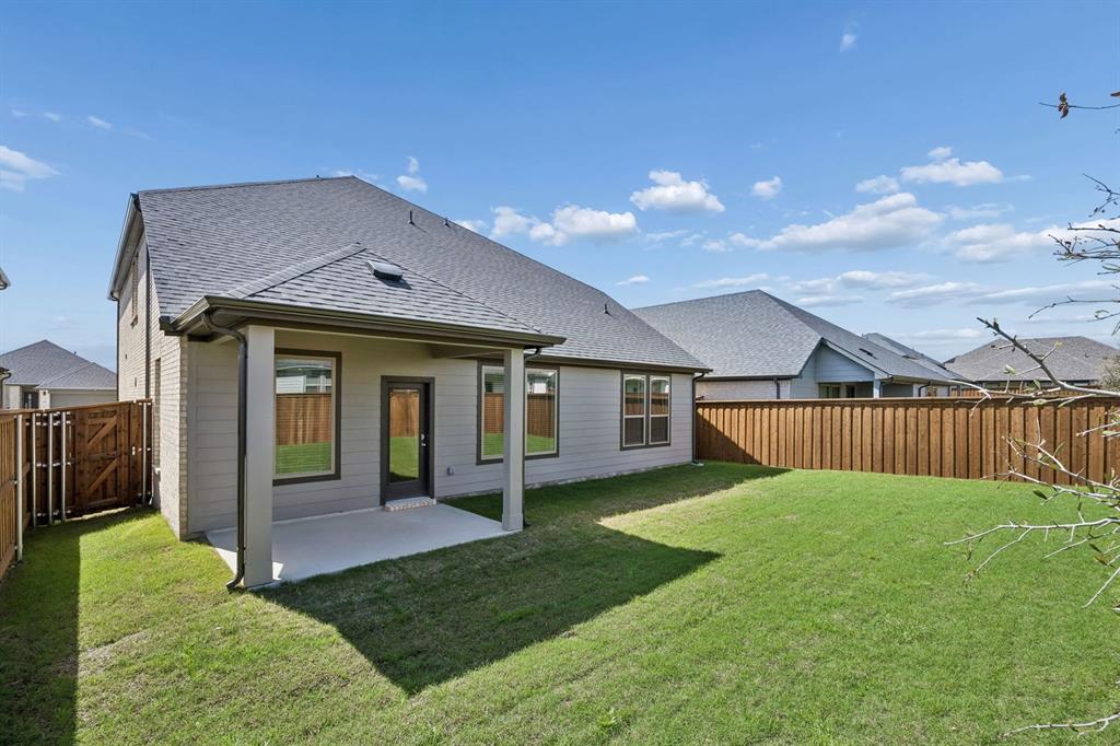 2105 Rowan Drive Anna, TX 75409 - Photo 34 of 37 Covered Patio in the Winters home plan by Trophy Signature Homes – REPRESENTATIVE PHOTO