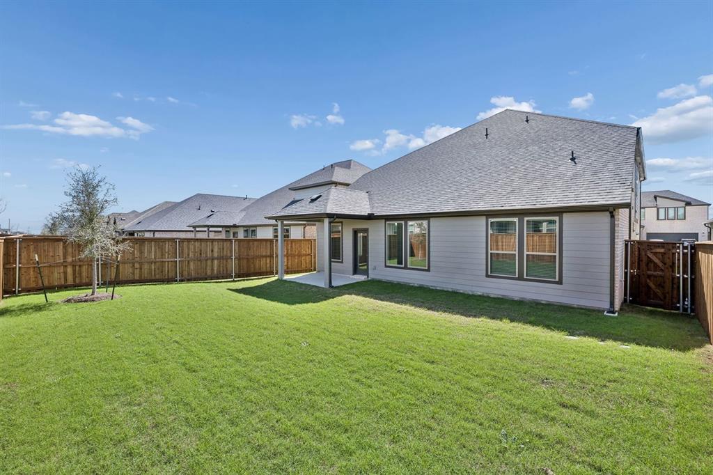 2105 Rowan Drive Anna, TX 75409 - Photo 35 of 37 Covered Patio in the Winters home plan by Trophy Signature Homes – REPRESENTATIVE PHOTO