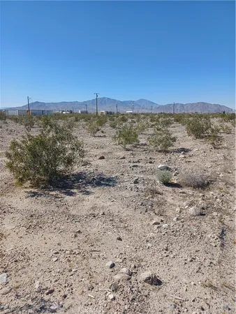 a view of a beach with a city view