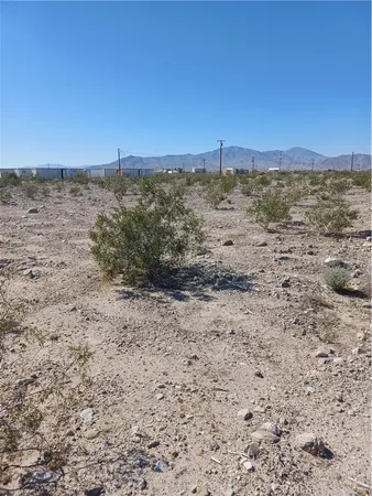a view of ocean and mountain