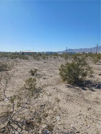 a view of a lake with a mountain in the background